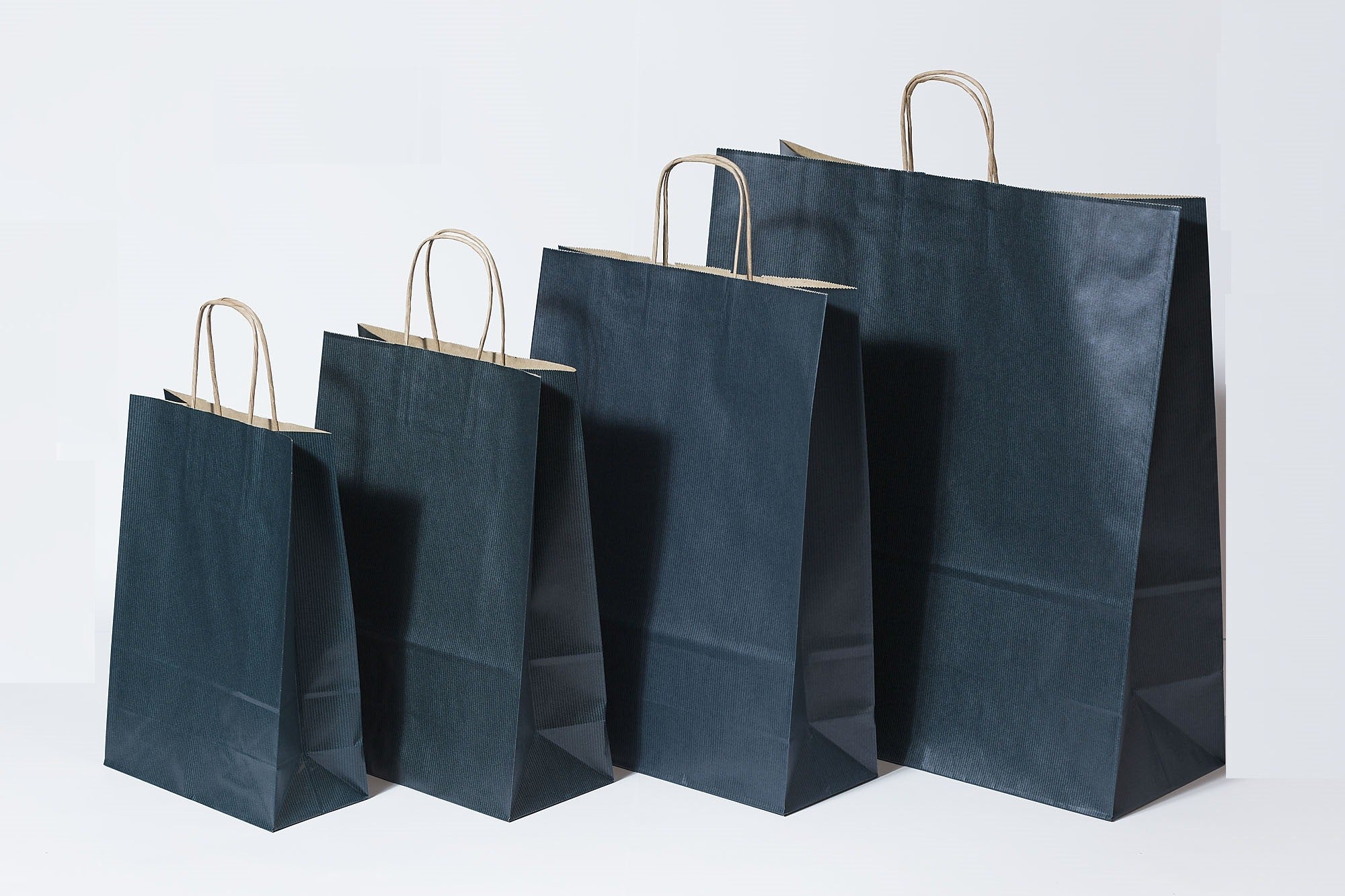 Paper Carrier Bags dark Blue 22+10x31cm Kraft 90 grams