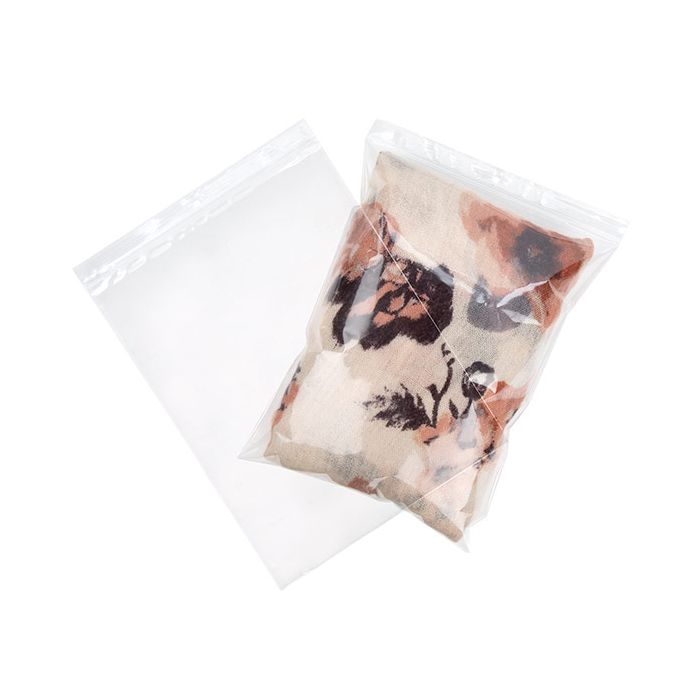 Grip Seal Bags with Hang hole 23x30.5cm Crystal Clear PP 50 micron, dislpaying the bag while filled and empty