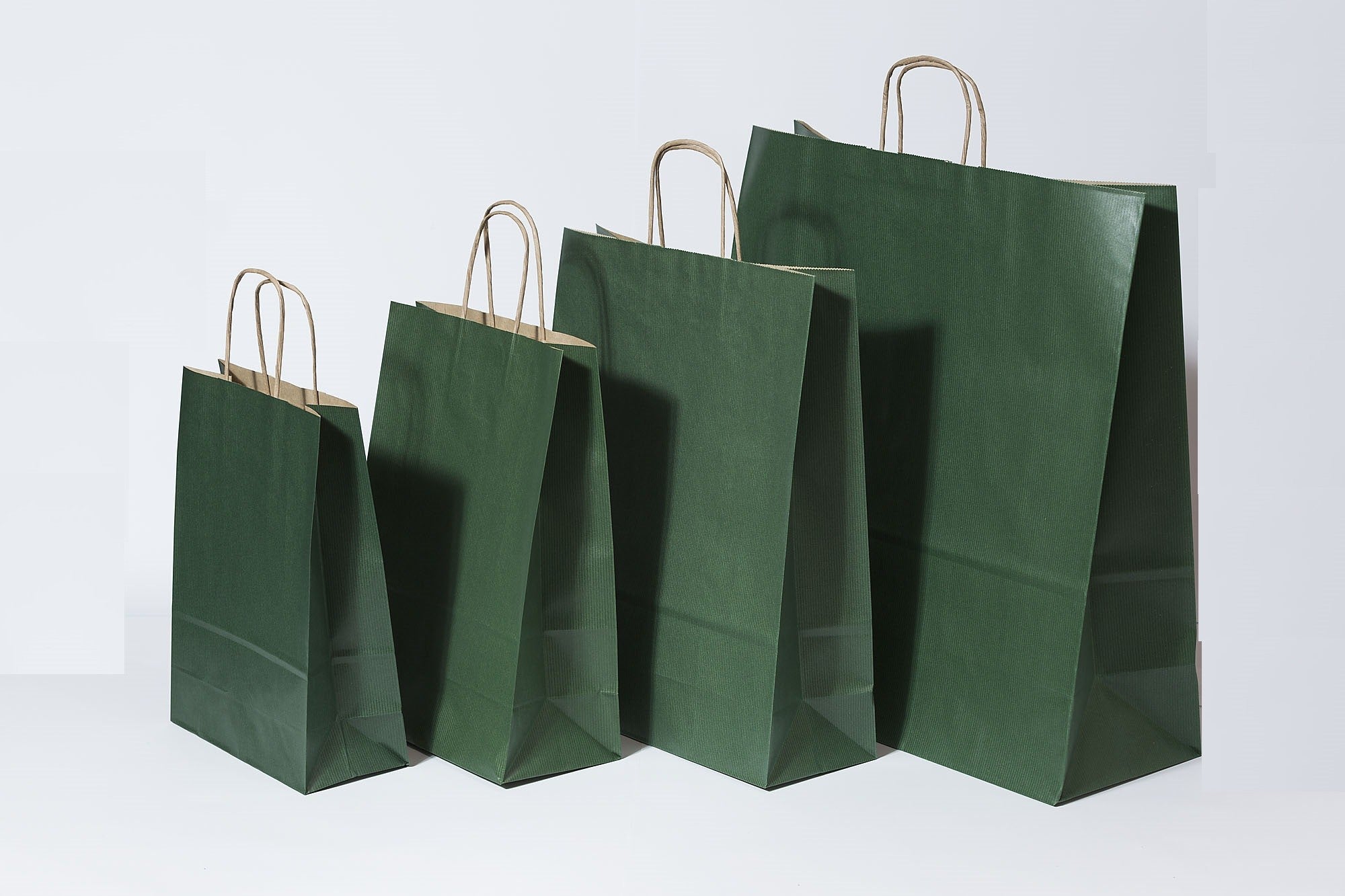 Paper Carrier Bags dark Green 26+12x35cm Kraft 90 grams