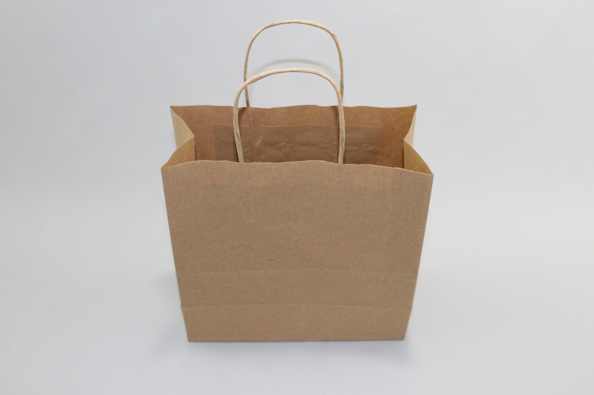 Papperskassar Brun 22x10x28cm Kraft Papper 90 gram med tvinnade handtag (50 st) [PAMB2231]